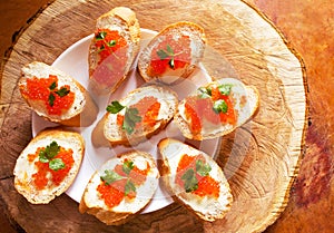 Sandwiches with salmon red caviar