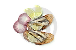 Sandwiches with sprats isolated on white background