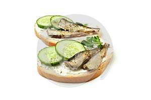 Sandwiches with sprats isolated on white background