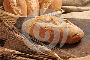 Sandwiches in a wicker basket on sackcloth photo