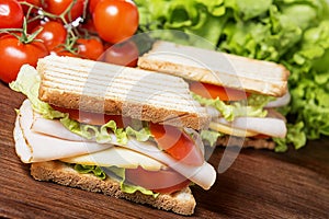 Sandwiches on wooden table