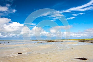 Sandy Bay and Cloudscape. Cata Sand, Sanday, Orkney, Scotland photo