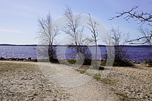 Sandy beach access coast at Lacanau lake in medoc Gironde France