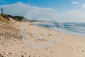 Sandy beach and Atlantic ocean with waves in Floripa. Morro das Pedras beach in Florianopolis photo