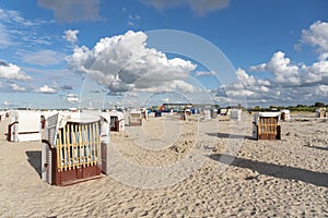 Sandy beach with beach baskets in Harlesiel