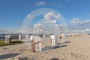 Sandy beach with beach baskets in Harlesiel