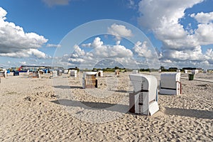 Sandy beach with beach baskets in Harlesiel