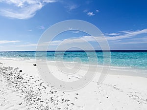 Sandy beach and blue skies photo