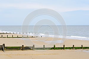 Sandy beach with breakwaters