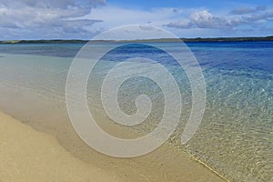 Sandy beach and clear water, Ofu island, Tonga