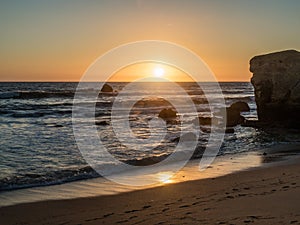 The sandy beach at Gale in the sunset.