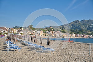 sandy beach in Giardini Naxos near Taormina, Messina, Sicily,