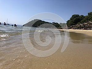 Sandy beach in Greece with clear water