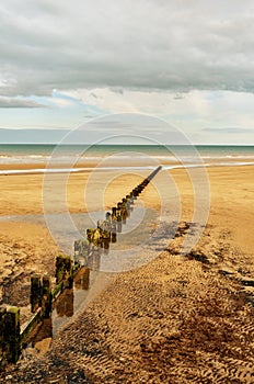Sandy beach and groyne