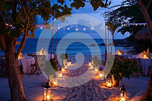 Sandy Beach Illuminated by Numerous Lit Candles, A candlelit pathway leading to a beautifully decorated beachside dinner setting,