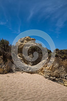 Sandy beach lined by cliffs, Gale, Portugal