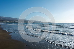 Sandy beach of Maspalomas with a view of the city on Gran Canaria, Spain