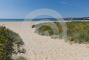 Sandy beach Par Cornwall England near St Austell and Polkerris with blue sea and sky