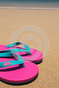 sandy beach and pink sandals