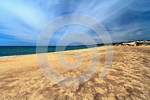 Sandy beach in Piscinas, Italy