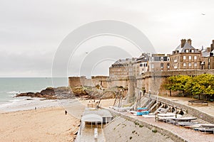 Sandy beach by Saint-Malo city walls