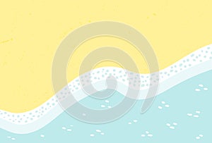 Sandy beach with sea, ocean waves lapping on shore, seaside top view background. photo