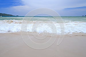 Sandy Beach and Sea Wave Foam on Coast in Phuket , Thailand