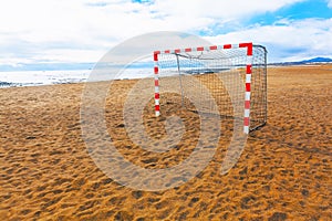 sandy beach with soccer field
