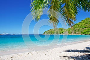 Sandy beach at summer sunny day.