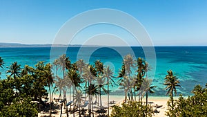 Sandy beach and turquoise water.