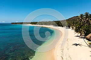 Sandy beach and turquoise water.