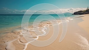 a sandy beach with waves coming in to the shore and a cliff in the distance