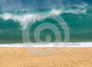 Sandy beach with waves in the distance