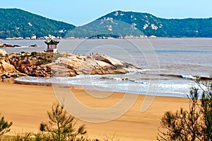 Sandy coast and clear sea