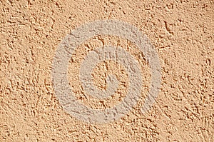 Sandy-colored modern grainy stucco texture photo