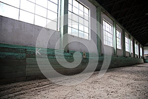 Sandy covering abandoned training arena for riders and horsemen