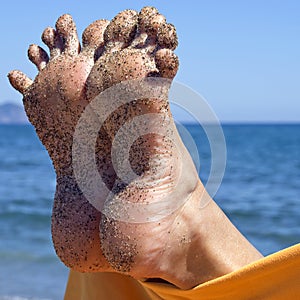 Sandy crazy woman toes on the beach