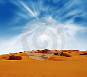 Sandy desert at sunrise time