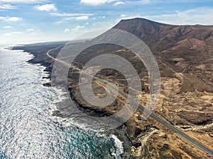 Sandy dunes and hills on Jandia peninsula near Playas de Sotavento en Costa Calma touristic resort, Fuerteventura, Canary islands