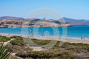 Sandy dunes and turquoise water of Costa Calma beach, Fuerteventura, Canary islands, Spain in winter