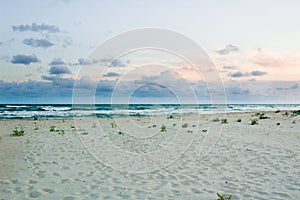 Sandy empty sea coastal sea view, cloudy colourful sunrise skyview