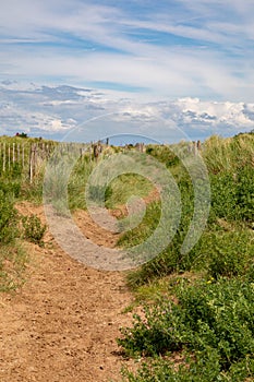 Sandy footpath at the North Wirral Coastal Path Leasowe Wirral England June 2019