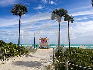 A sandy path leads to a Lifeguard tower on the wondeful North Beach of Miami Beach