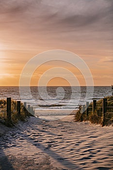 Sandy path the sunset on Grange Beach, South Australia