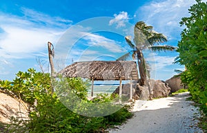 Sandy path to the beach in world famous Anse Source d\'Argent