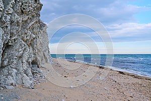 Sandy seashore and white rock in the background. Byala Bulgaria