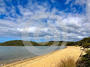 Sandy shore of Coalmine Beach, Nornalup Inlet in Walpole, Australia.