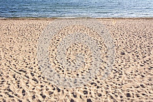 Sandy shore and Gulf of Finland on the background, Cental beach, Hanko, Finland photo