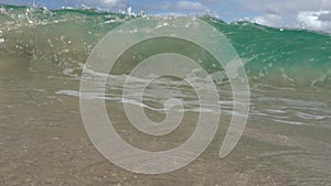 Sandy wave in Hawaii shorebreak