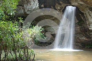 Sang Chan Waterfall is sometimes called Namtok Long Ru Waterfall Through a Hole .